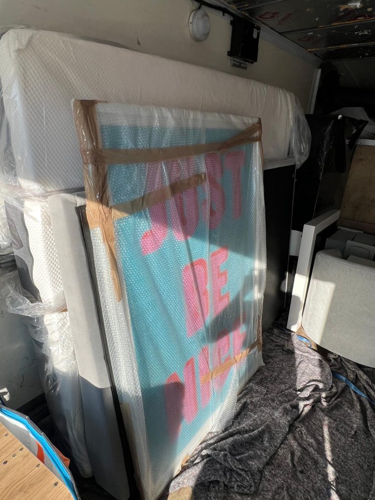 removals wimbledon. packed art loaded in a van